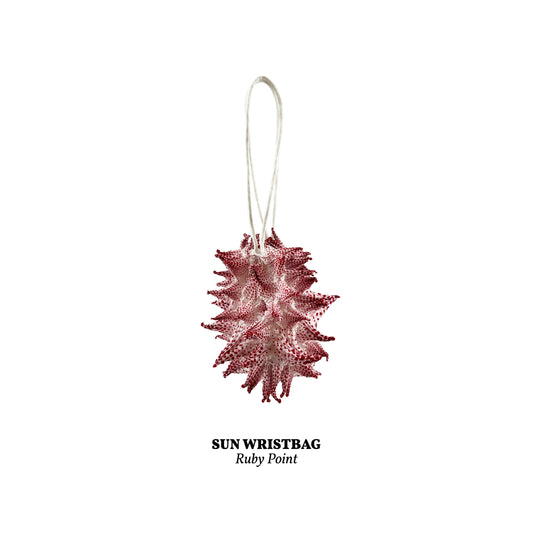 SUN WRISTBAG RUBY POINT